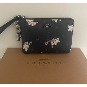 COACH Snowman Wristlet with Charms